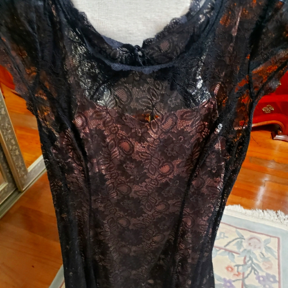 Beautiful black lace dress with cream colored shell underneath